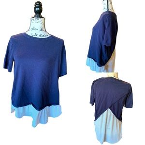Loft short sleeve navy blue top . Sweater over chiffon crisscross back . Medium